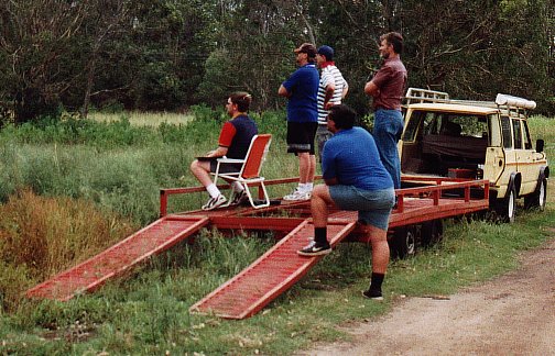 The team watching the progress of pig 