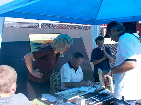 LEO GEOGHEGAN autographing books and posters