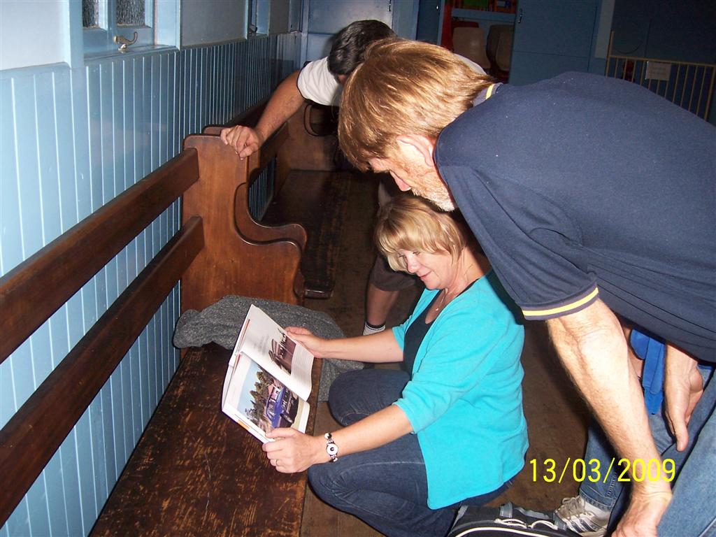 Leyland meeting- Ann Graham and Graham looking at Gavin Farmers Book